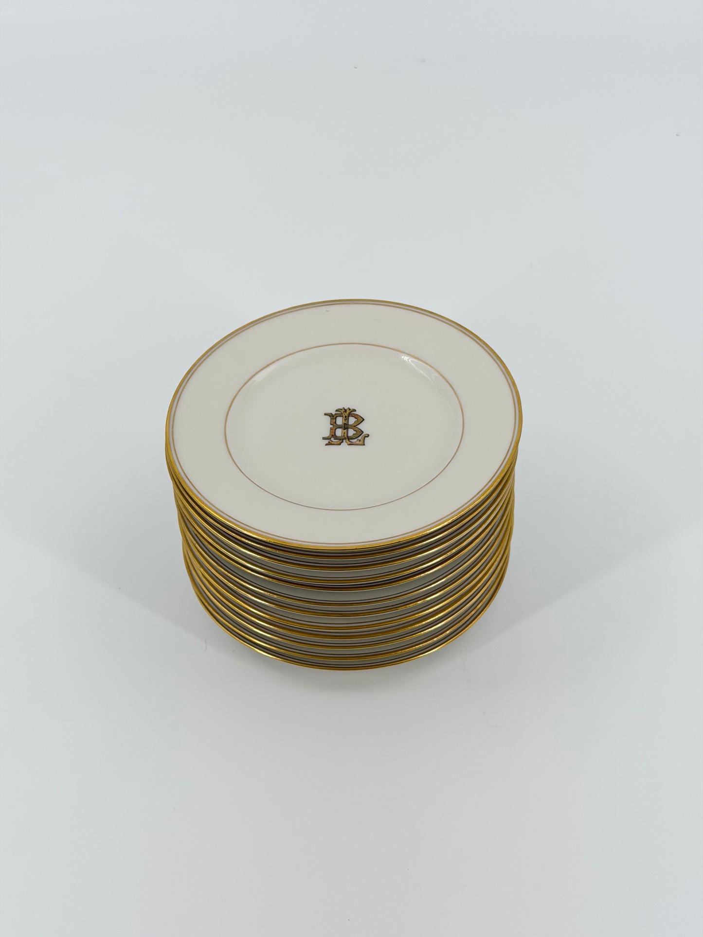Set of Theodore Haviland monogrammed bread plates