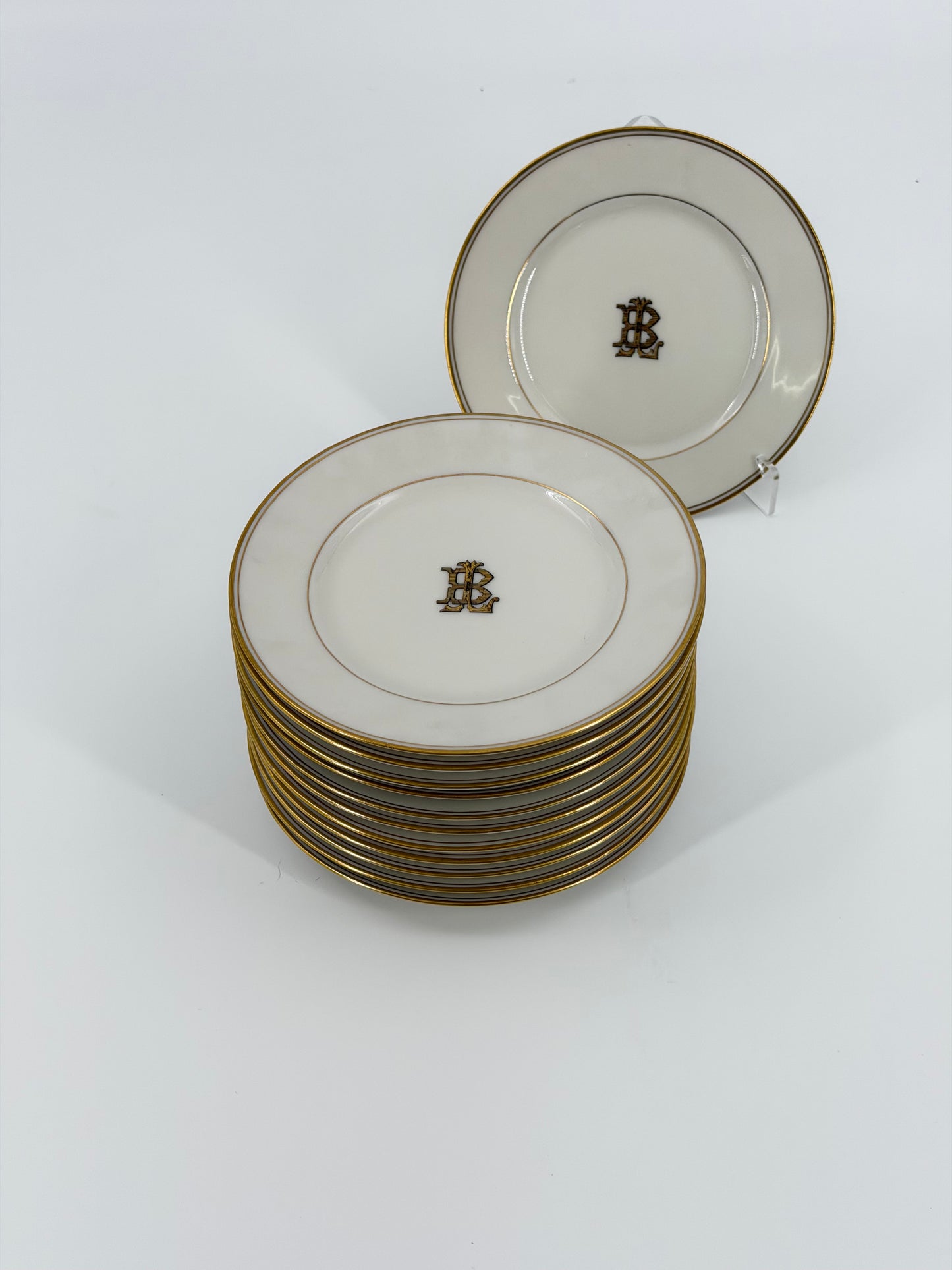 Set of Theodore Haviland monogrammed bread plates