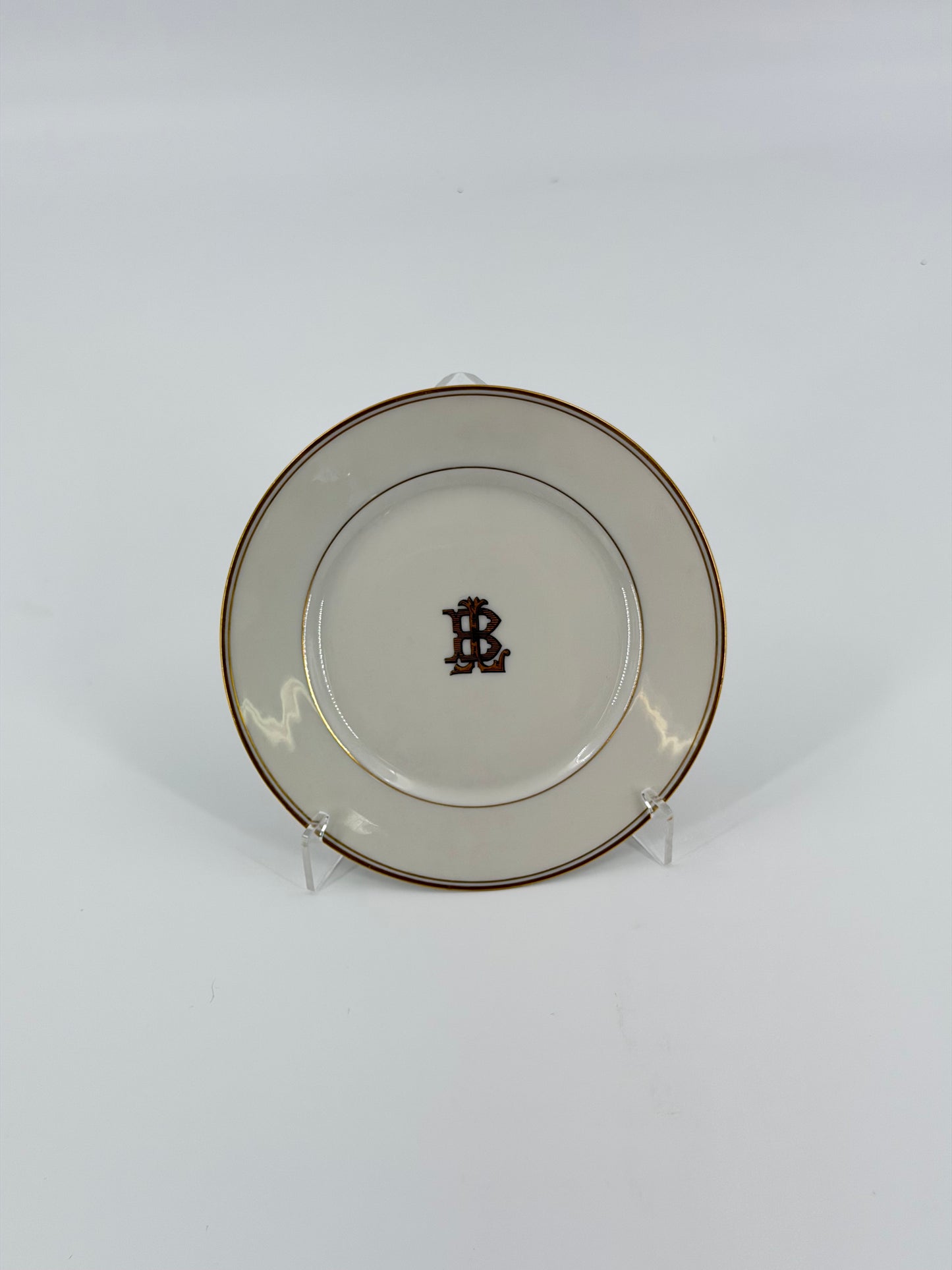 Set of Theodore Haviland monogrammed bread plates