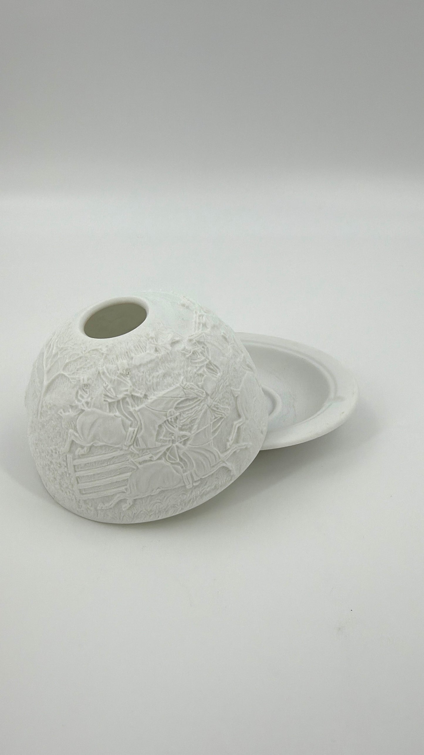 Bernardaud candle holder featuring a horse race scene