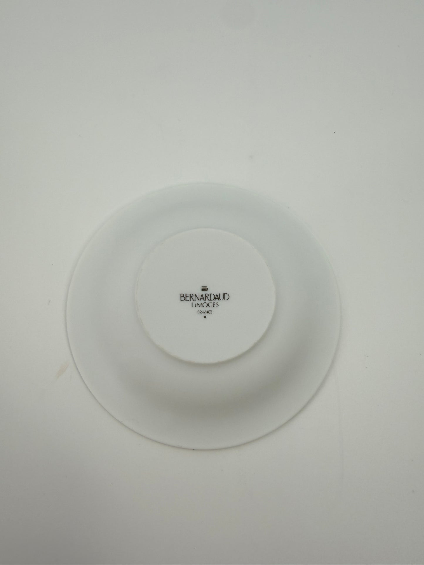 Bernardaud candle holder featuring a horse race scene