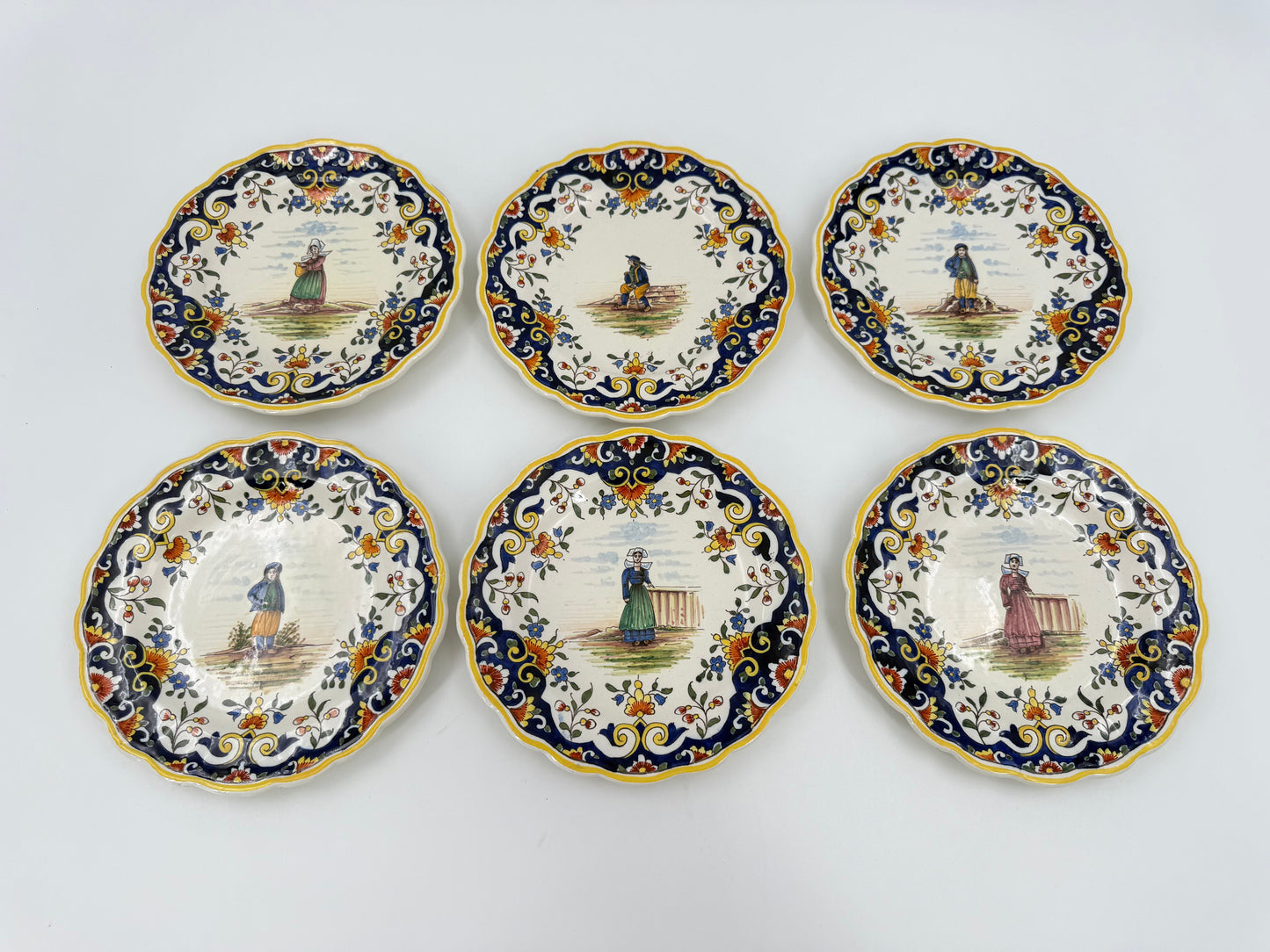 Set of 13 hand-painted French Breton earthenware plates, “Le Pouliguen”
