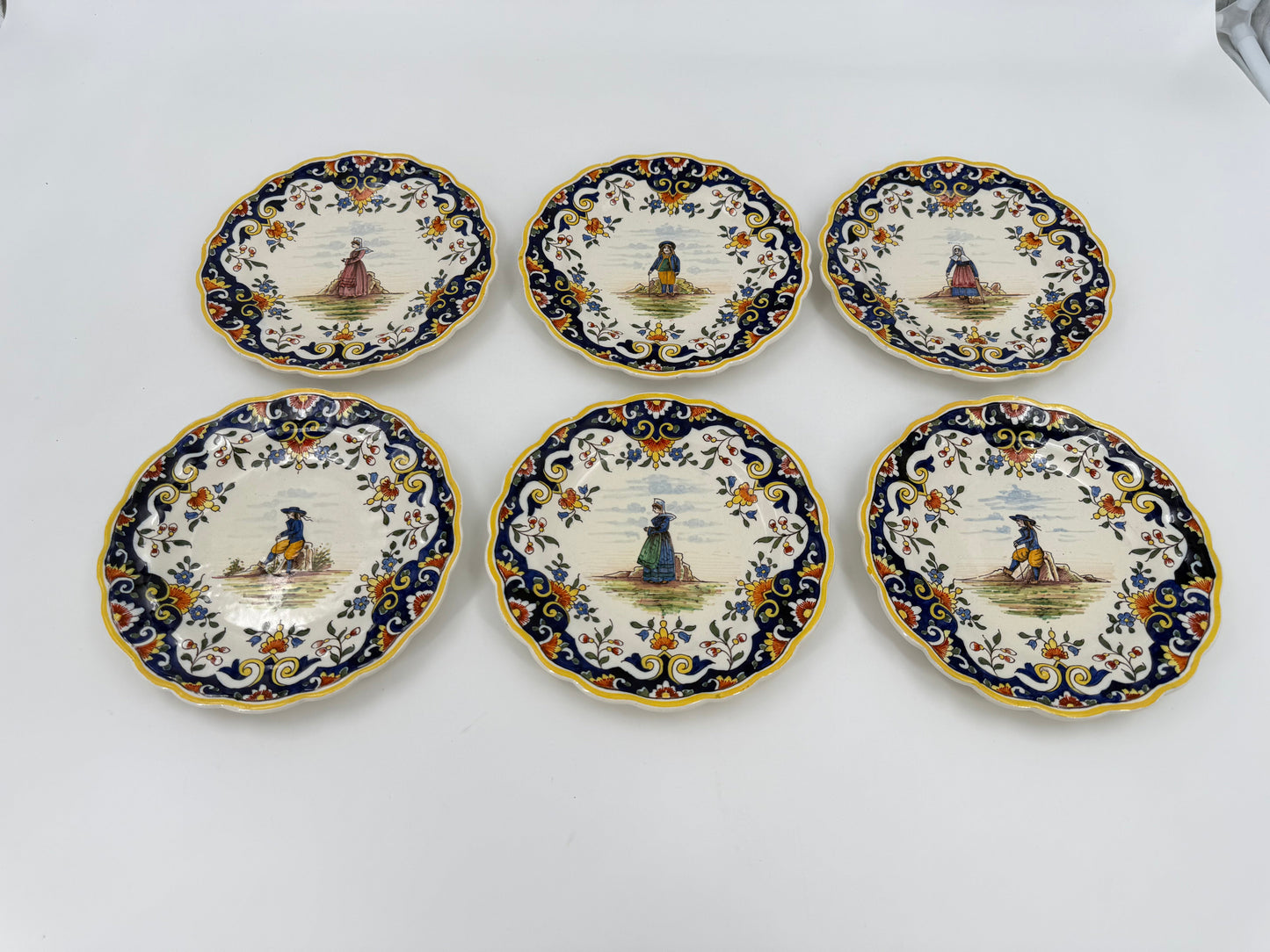 Set of 13 hand-painted French Breton earthenware plates, “Le Pouliguen”