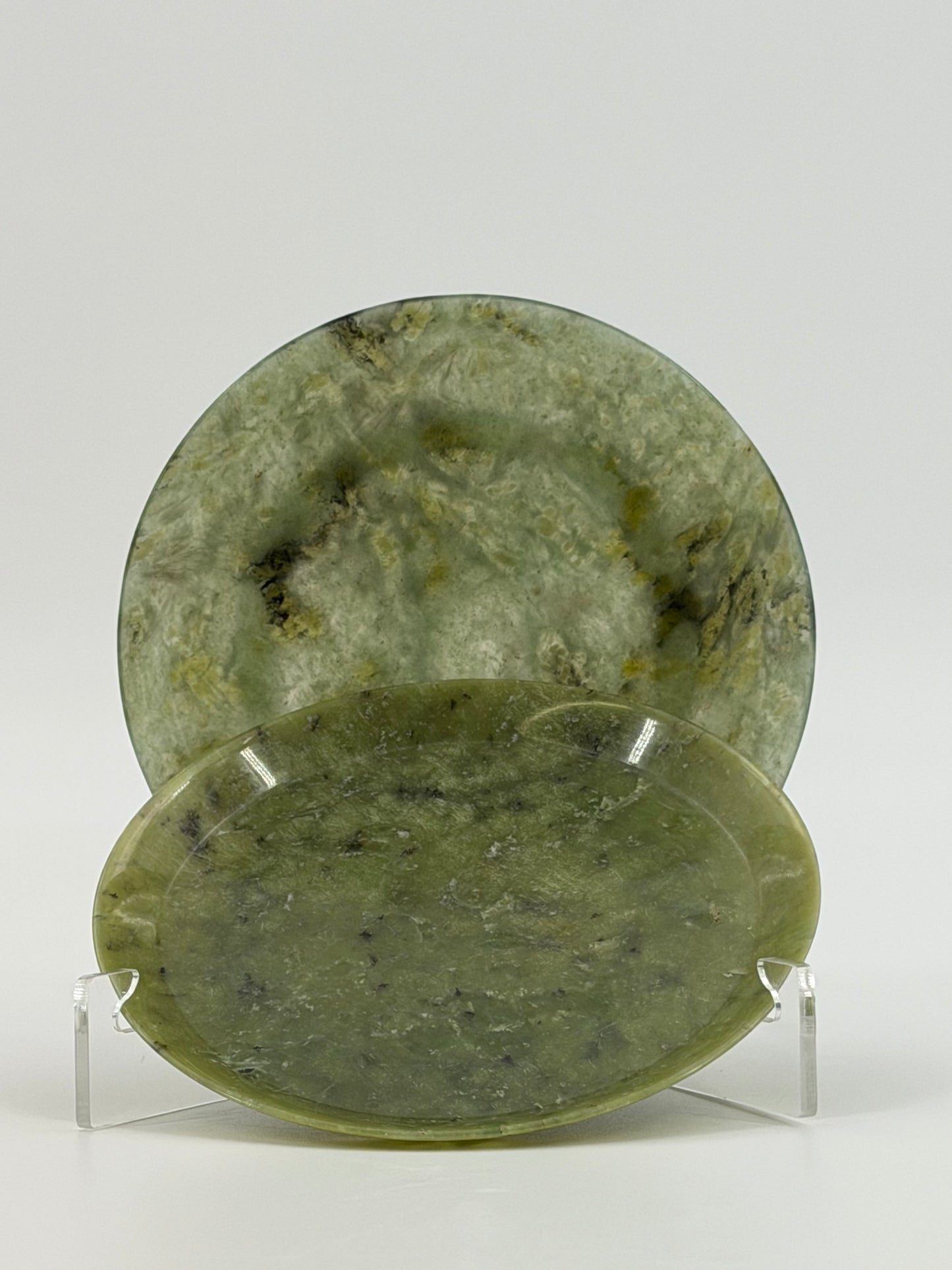 A pair of decorative plates in polished green serpentine